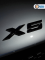 Эмблема пластиковая BMW X5 черный 15х3 см