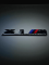 Эмблема пластиковая BMW X1 M Competition черный